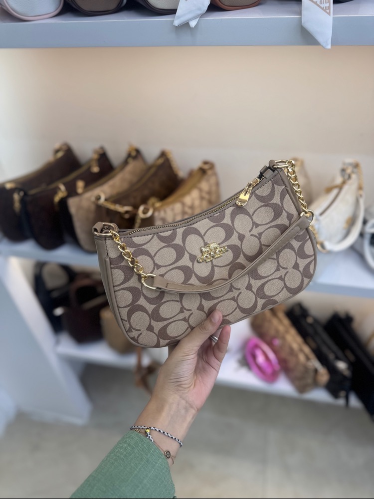 کیف دستی زنانه طرحدار برند کوچ 