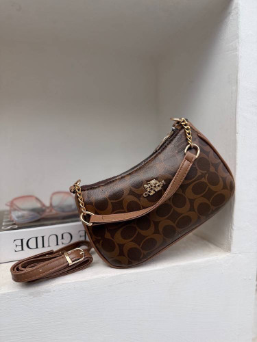 کیف دستی زنانه قایقی طرحدار برند کوچ Coach مناسب روزمره و مهمانی کد 314